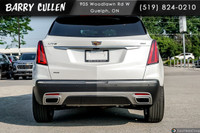 The 2024 Cadillac XT5 AWD Premium Luxury stands out in its stunning white exterior, delivering excel... (image 4)