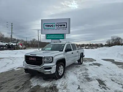 2018 GMC Sierra 1500 4WD Crew Cab SLE with a 5.3L. This truck is equipped with power drivers front s...