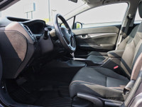 Experience the perfect blend of efficiency, comfort, and modern features with the 2015 Honda Civic E... (image 8)