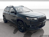 The 2023 Jeep Cherokee Altitude in Diamond Black Crystal Pearlcoat features premium leather-faced se... (image 7)