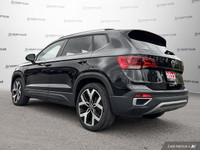 Command attention with the 2022 Volkswagen Taos Highline SUV. This sleek black beauty boasts a panor... (image 3)