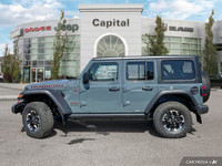 This Jeep Wrangler has a powerful ERC 3.6L Pentastar(TM) VVT V6 engine w/ESS engine powering this Ma... (image 1)