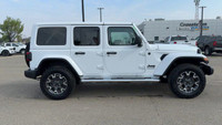 This 2025 JEEP WRANGLER 4-DOOR SAHARA has the following options Cloth Low-Back Bucket Seats, Remote... (image 9)