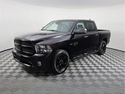 You can expect more from our 2023 RAM 1500 Classic Express Crew Cab 4X4 in Granite Crystal Metallic!...