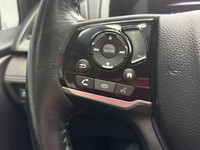 Meet the 2019 Honda Odyssey EX-L RES, a silver front-wheel-drive van that promises a smooth journey... (image 9)