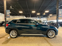 Our outstanding Blue 2015 BMW X1 xDrive35i offers fun driving dynamics great versatility and awesome... (image 5)