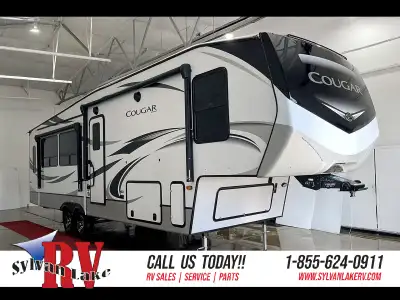 The 2021 Keystone Cougar 315RLS is a fifth wheel that blends residential comfort with road-ready dur...