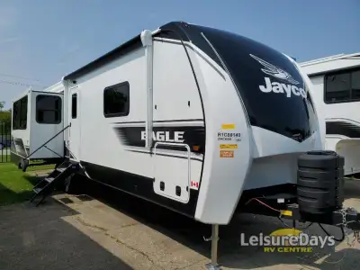 Jayco Eagle travel trailer 294CKBS highlights: Hutch Fireplace Front Private Bedroom USB Charging Po...