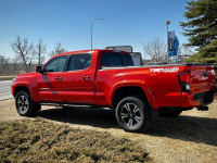 Stock#: 250595AThe 2018 Toyota Tacoma SR5 V6 4x4 Double Cab with a 6 ft box is a versatile and capab... (image 3)