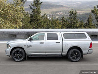 Command the road with this powerful 2021 Ram 1500 Classic Express Crew Cab. Boasting a robust 5.7L H... (image 1)