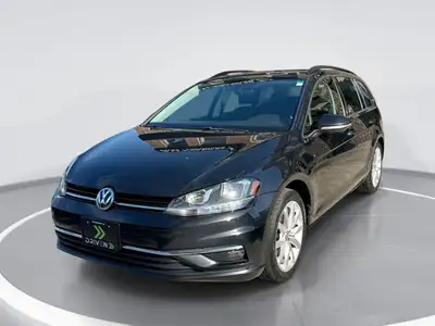 Experience the seamless blend of style and functionality with the Black Volkswagen Golf SportWagen C...