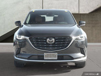 This 2022 Mazda CX-9 Grand Touring, boasting a powerful turbocharged engine and all-wheel drive for... (image 1)