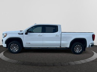 The All New GMC Sierra has been redefined from Hood to Hitch. This 4WD White Sierra is a Crew Cab Pi... (image 1)