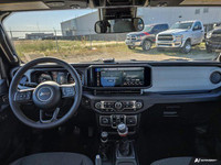 This Jeep Wrangler boasts a Regular Unleaded V-6 3.6 L/220 engine powering this Manual transmission.... (image 9)
