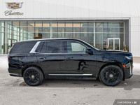 The 2022 Cadillac Escalade highlights include adaptive cruise control, panoramic roof, 3rd-row seati... (image 5)