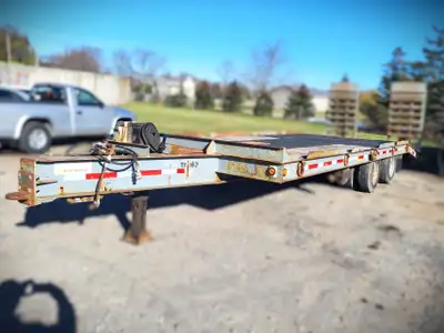 1998 JC Trailer Equipment trailer. Pintle hitch. 20ft deck length with 5ft beavertail plus ramps. 16...