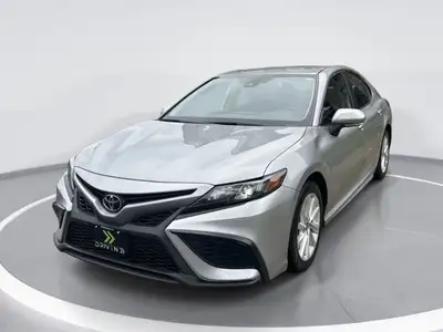 Experience the refined elegance of the Toyota Camry SE Automatic in stunning silver, matched perfect...