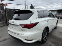 This 2017 Infiniti QX60 is a spacious and reliable SUV, perfect for driving in style and comfort. Wi... (image 4)