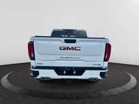 The All New GMC Sierra has been redefined from Hood to Hitch. This 4WD White Sierra is a Crew Cab Pi... (image 3)