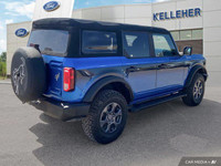 Unleash the thrill of open-air adventure with this stunning 2022 Ford Bronco convertible. Its powerf... (image 4)