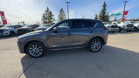 This Mazda CX-5 is equipped with: Leather Seat Upholstery, Power moonroof, Heated front seats, Heate... (image 7)