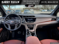 The 2023 Cadillac XT5 AWD Sport in a sleek black exterior blends luxury and performance with all-whe... (image 8)