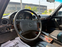 Step into timeless elegance with this beautifully preserved 1989 Mercedes-Benz 560SL, the final mode... (image 4)