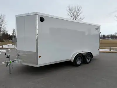 7'4x16 cargo trailer with ramp door. 2x3500lb axles. 4 heavy duty d-rings. White in colour. 2025 Tri...