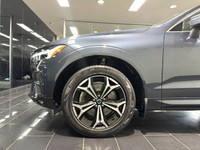 The 2022 Volvo XC60 Momentum blends luxury and performance seamlessly, offering a refined driving ex... (image 4)