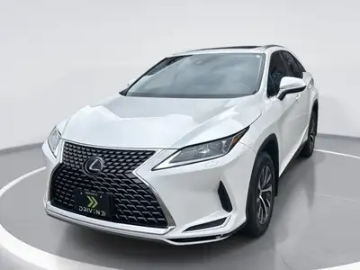 Sleek and stylish, the white Lexus RX 350 AWD delivers impressive handling as an SUV ready for all y...