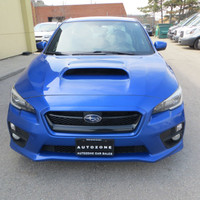 Check out this stylish 2015 Subaru WRX Premium sedan with a sleek blue exterior and a comfortable bl... (image 1)