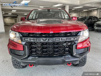 Get behind the wheel in our used 2021 Chevrolet Colorado ZR2 Crew Cab short box 4X4 in Cherry Red Ti... (image 7)