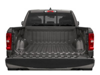 The 2026 Ram 1500 Laramie in a striking black exterior, matched with a robust 4x4 drivetrain, delive... (image 7)