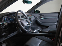 This 2024 Audi Q8 e-tron blends all-electric power with refined luxury, finished in a sleek dark gre... (image 9)