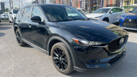 Le Mazda CX-5 Touring 2021 est un VUS compact qui allie style, performance et confort. Positionné da... (image 2)