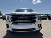 Roll out in style with this elegant and robust 2023 GMC Yukon SLT, showcasing a luxurious White Fros... (image 2)