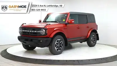 Experience the power and style of the red 2023 Ford Bronco Outer Banks 4 Door Advanced 4x4, boasting...