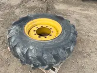 Titan 16.9-24 backhoe spare tire on rim