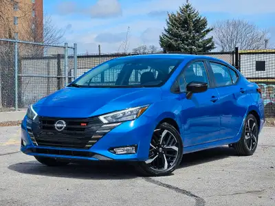 Buckle up, because this 2023 Nissan Versa SR CVT in Electric Blue Metallic isnt just a carits your t...