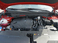 Command attention with the 2023 Hyundai Tucson Preferred, a crimson red SUV that seamlessly blends s... (image 7)