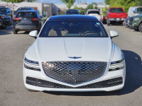 Experience the impressive 2023 Genesis G80 2.5T Advanced, a stunning white all-wheel-drive sedan tha... (image 2)