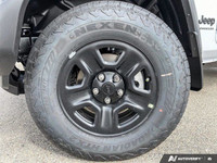 This Jeep Wrangler has a dependable EC1 2.0L DOHC I-4 DI turbo engine w/ESS engine powering this Aut... (image 9)