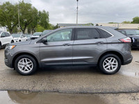 **WE WILL BEAT ANY DEALER IN THE CITY** Carbonized Gray Metallic 2023 Ford Edge SEL AWD 8-Speed Auto... (image 2)