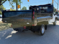 DUMP TRUCK with Hydraulic Lift in excellent condition with a clean carfax and one previous owner. Wi... (image 3)