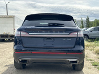 Under the glistening Rhapsody Blue exterior, the 2019 Lincoln Nautilus Reserve stands as a testament... (image 5)