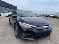 2016 Honda Civic touring comes with Push button, Navigation, backup cameras, sunroof, heated seats,... (image 1)