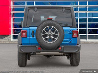 This Jeep Wrangler has a trusty Intercooled Turbo Premium Unleaded I-4 2.0 L/122 engine powering thi... (image 6)