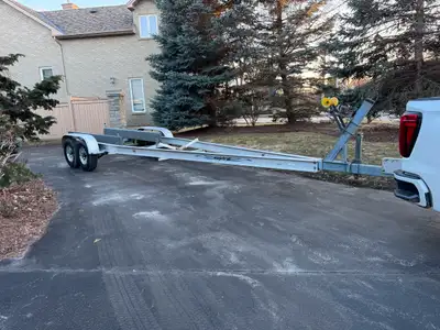 Aluminum tandem axle boat trailer 2 6000lb axles aluminum wheels surge brakes Fully adjustable bunk...