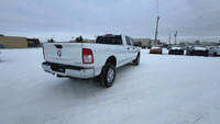 This Ram 2500 is equipped with: Cloth Front 40/20/40 Bench Seat, Radio: Uconnect 5 w/8.4 Display, 4G... (image 8)