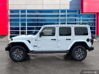 This Jeep Wrangler has a trusty Regular Unleaded V-6 3.6 L/220 engine powering this Automatic transm... (image 1)